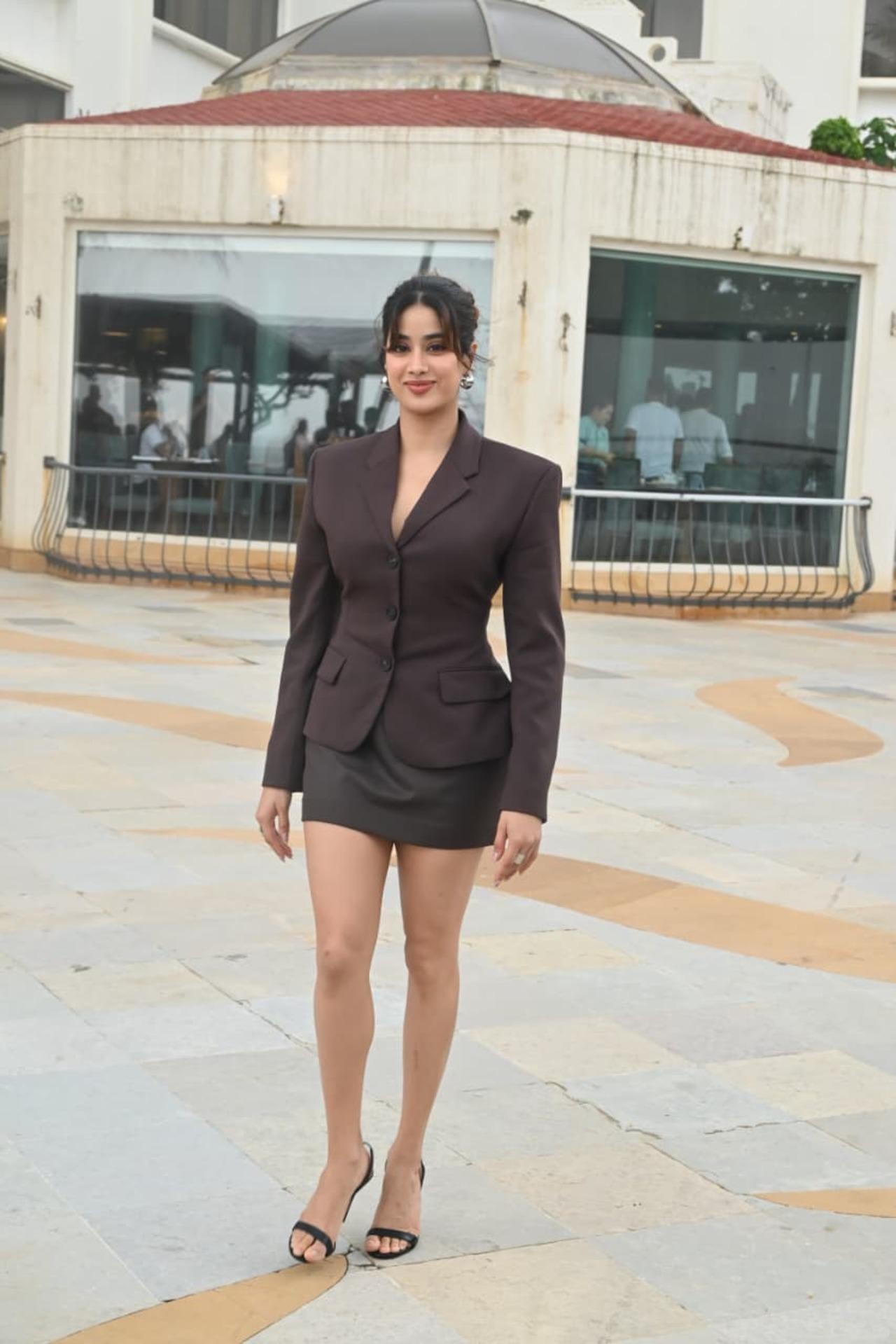 She completed the look with minimal black strappy heels, earrings and minimal makeup that added elegance.